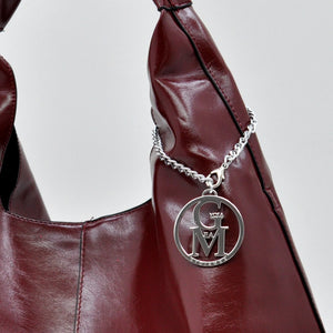 La Mattea - Borsa donna firmata Gyoiamea a sacco hono in similpelle lucida mono manico