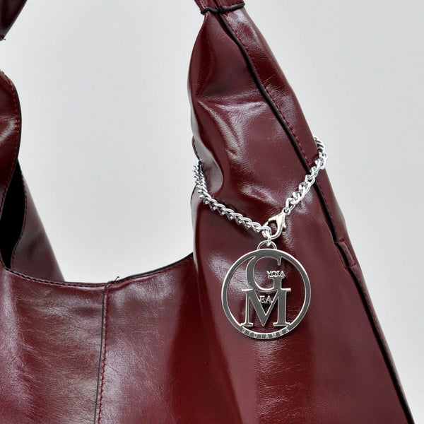 La Mattea - Borsa donna firmata Gyoiamea a sacco hono in similpelle lucida mono manico