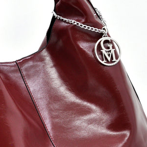 La Mattea - Borsa donna firmata Gyoiamea a sacco hono in similpelle lucida mono manico