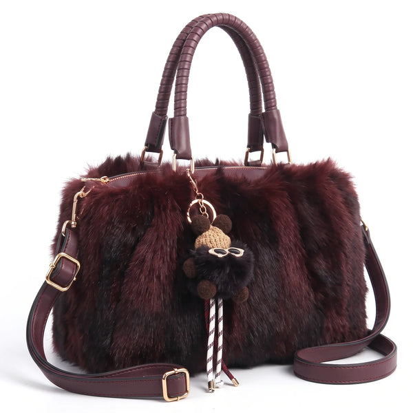 Bauletto in pelliccia sintetica 855, colore bordeaux, vista su sfondo bianco
