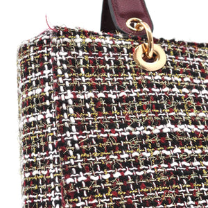 Borsa CHARRO in tessuto TWEED bouclé raffinato