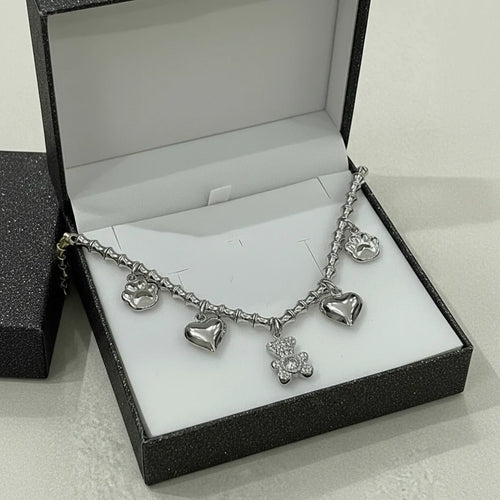 Collana Charm con Orsetto Brillante e Cuori acciaio inossidabile Finitura Oro Giallo - Regolabile