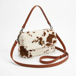 Borsa a tracolla animalier effetto pelliccia con patta, pezzato bianco e marrone