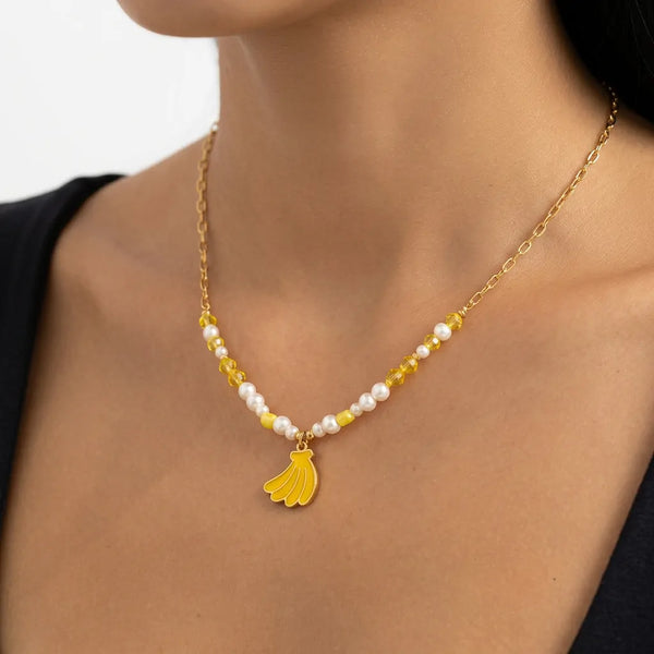 Banana Chic - Collana Catena acciaio colore Oro e Perline con Ciondolo banane casco Smaltata