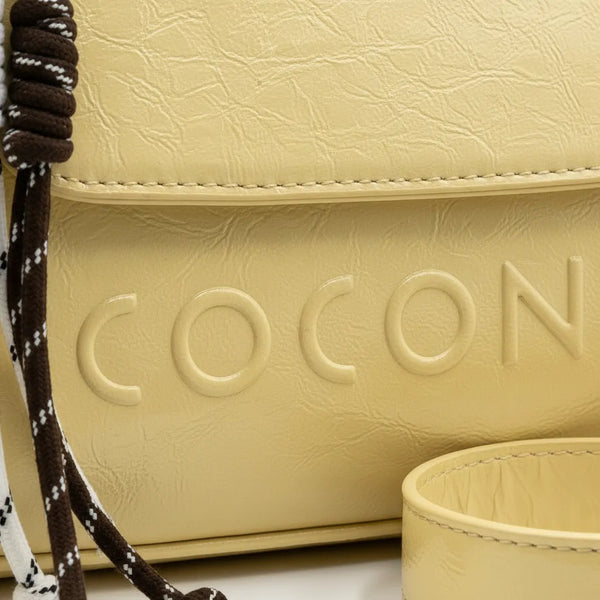 Coconuda - Tracolla logo 3d borsetta con charms