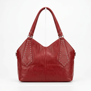 Borsa shopper donna a spalla con borchie e tracolla rosso - vista frontale senza tracolla