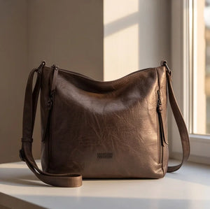 Borsa Nazareno Gabrielli con zip laterali e tracolla - Caffè vicino alla finestra