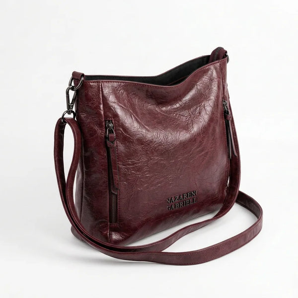 Borsa Nazareno Gabrielli con zip laterali e tracolla bordeaux - vista principale