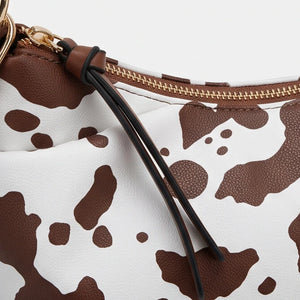 La selvaggia - Borsa a sacco hobo simil pelle fantasia animalier leopardata mucca