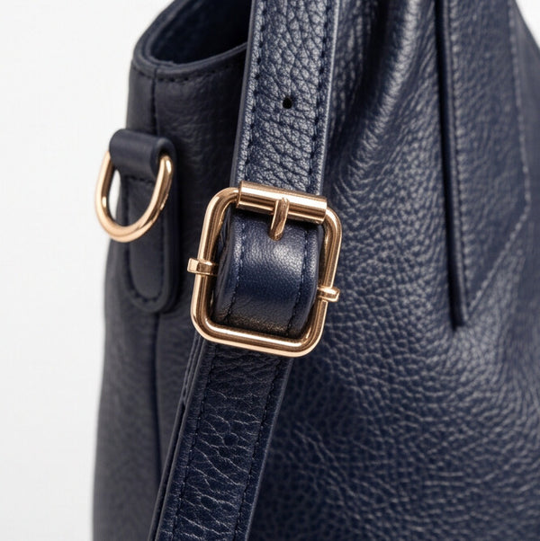 Borsa donna arrotondata con manici intrecciati e tracolla con nodo