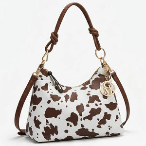 La selvaggia - Borsa a sacco hobo simil pelle fantasia animalier leopardata mucca