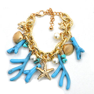 Parure Collana e bracciale turchese lunga stelle marine corallo perle rami mare